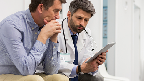 Patient talking with doctor