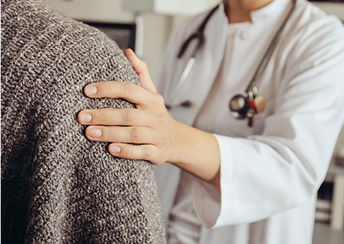 patient talking to their doctor